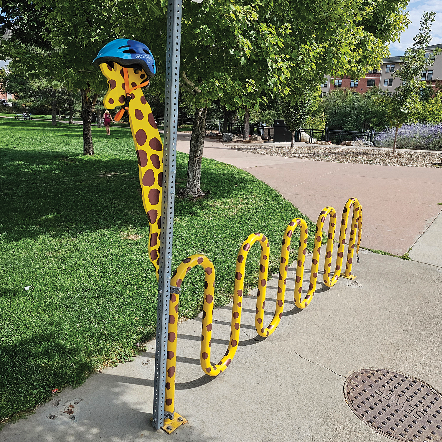 Giraffe painted on a bike rack